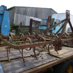 Pig tail spring tine cultivator