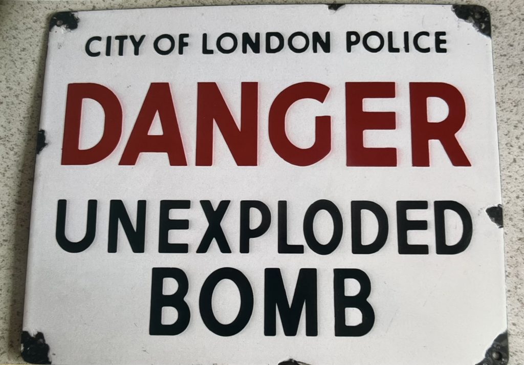 Enamel sign City London Police Unexploded Bomb