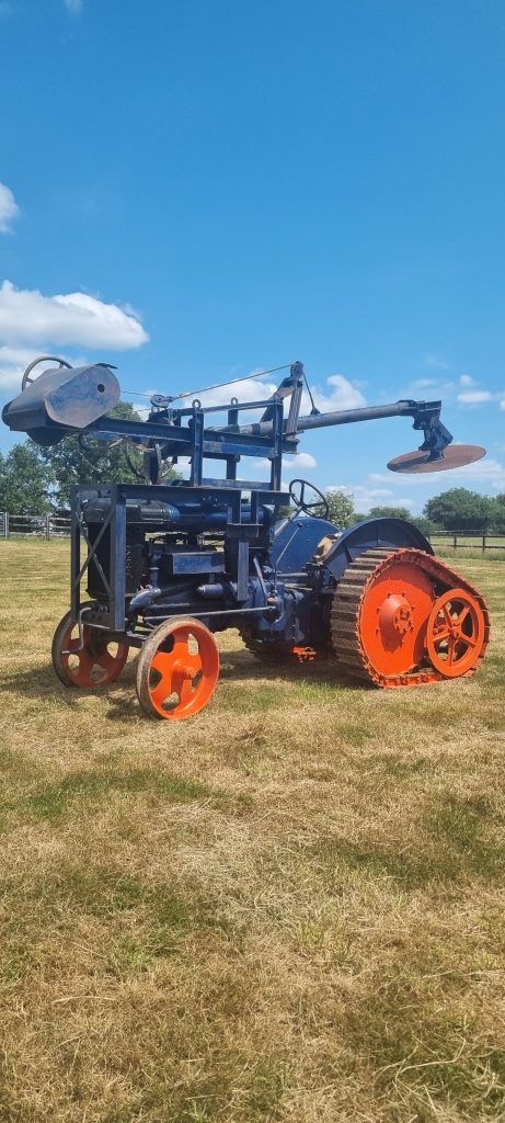 Roadless E27N half track with a Foster hedge cutter fitted