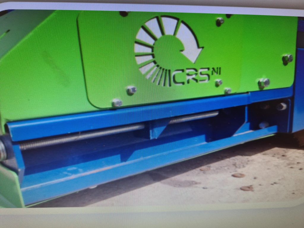 Komptech Semi-mobile 2-fraction screening system with CRS NI Ltd hopper and feed conveyor