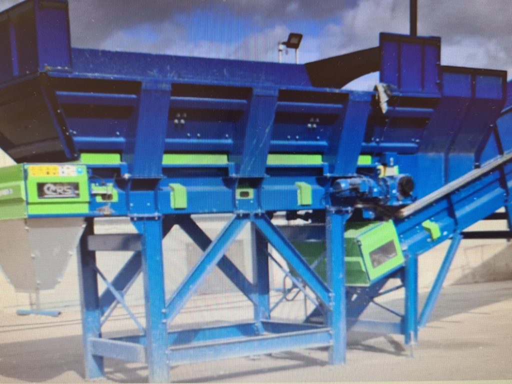 Komptech Semi-mobile 2-fraction screening system with CRS NI Ltd hopper and feed conveyor