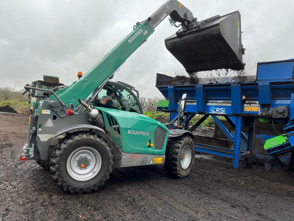 Komptech Semi-mobile 2-fraction screening system with CRS NI Ltd hopper and feed conveyor