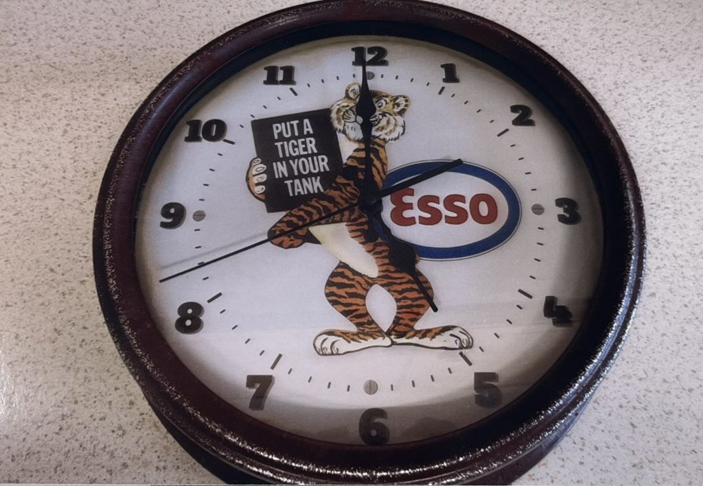 Put A Tiger In Your Tank Wall Clock